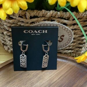 Coach Silver Tone Signature Dangle Logo Earrings